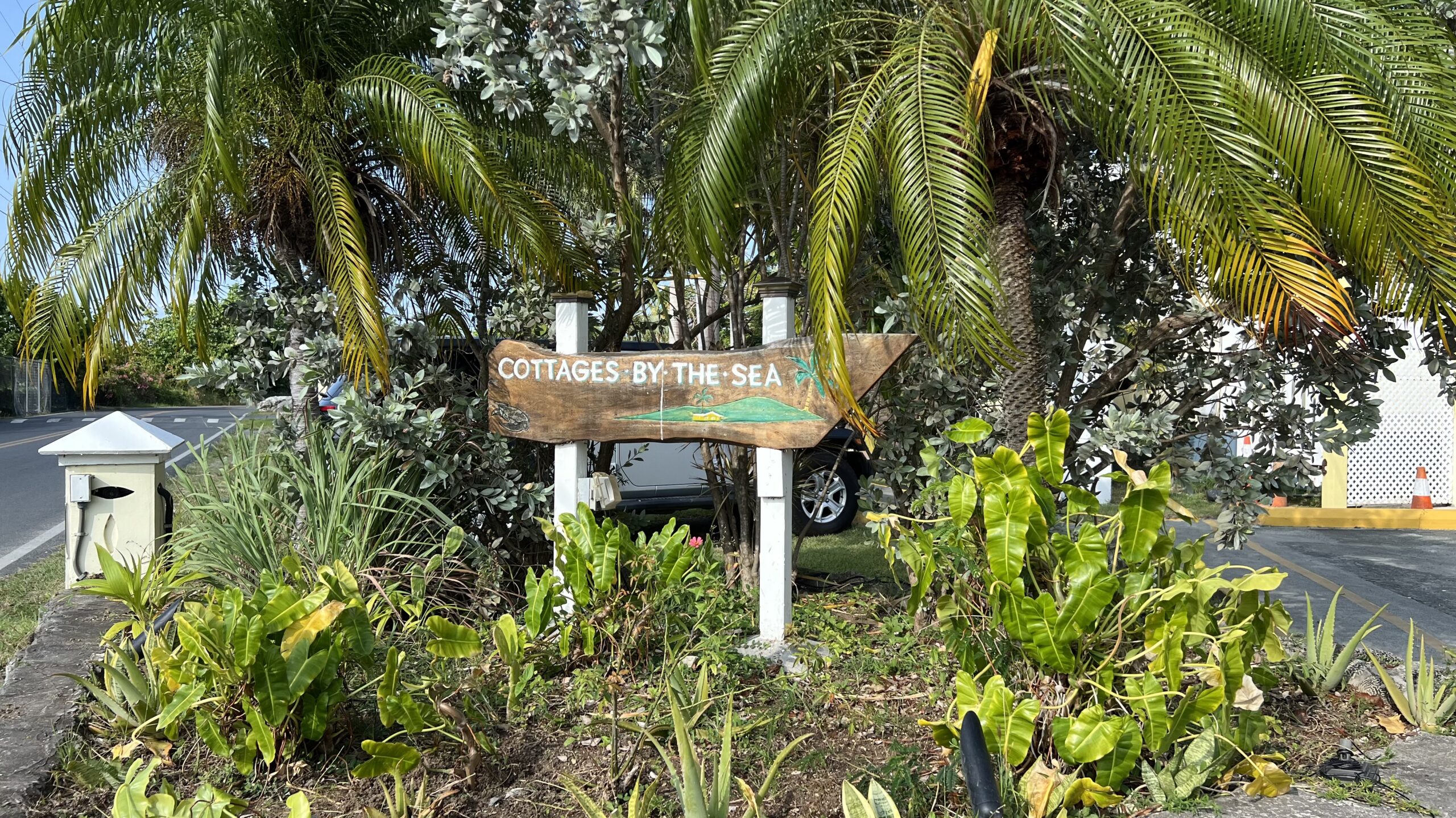 Cottages by the Sea sign